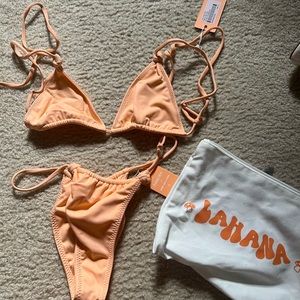 La Hana swimsuit. Never worn hygienic and regular tags still on!!